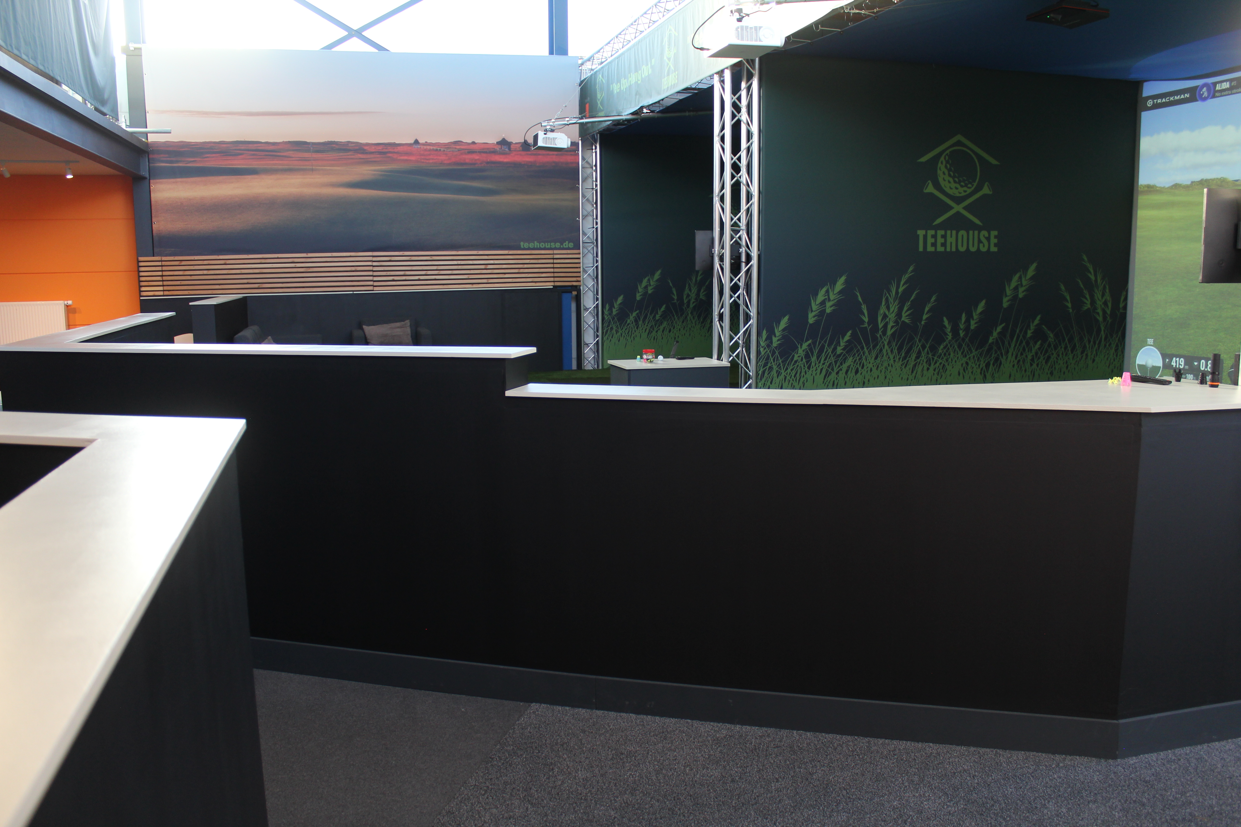 Bright hall with course visuals